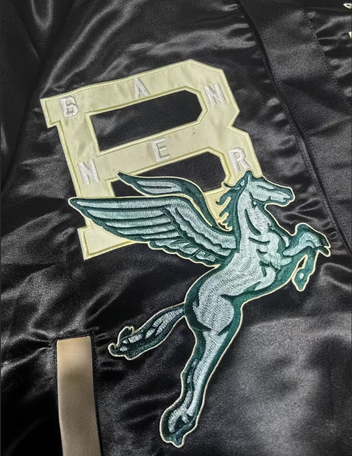 Banner House jacket: custom repeat lining, chenille, appliqué, leather trim and embroidery