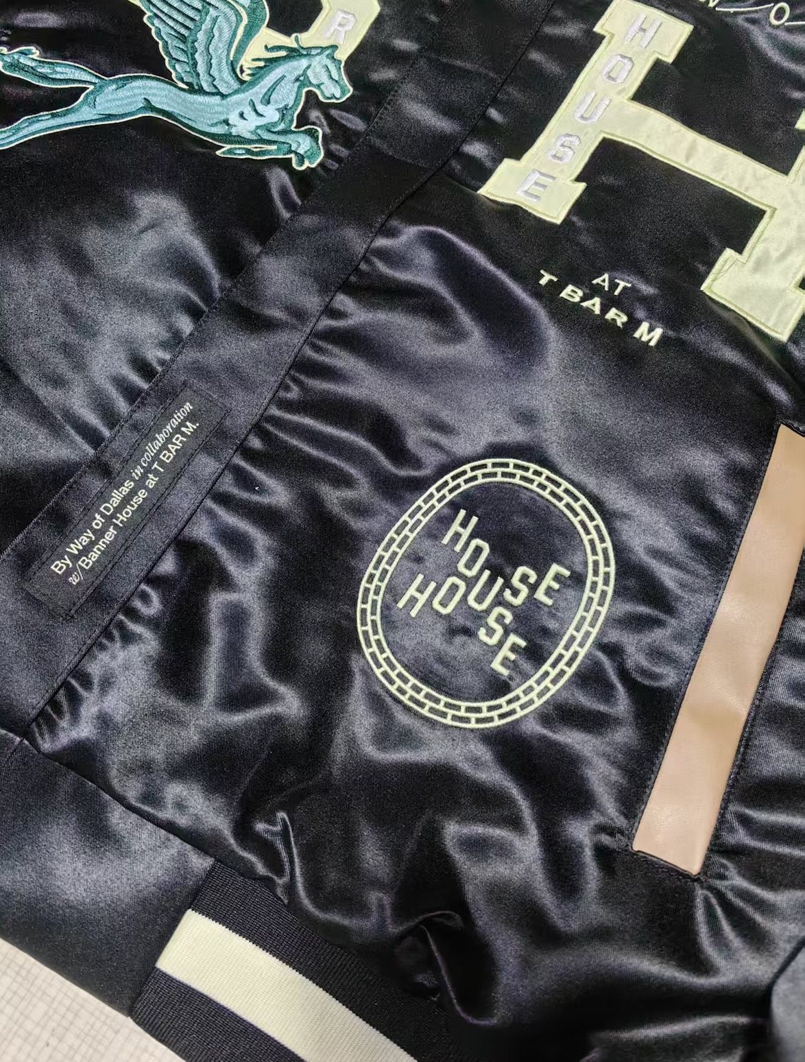 Banner House jacket: custom repeat lining, chenille, appliqué, leather trim and embroidery