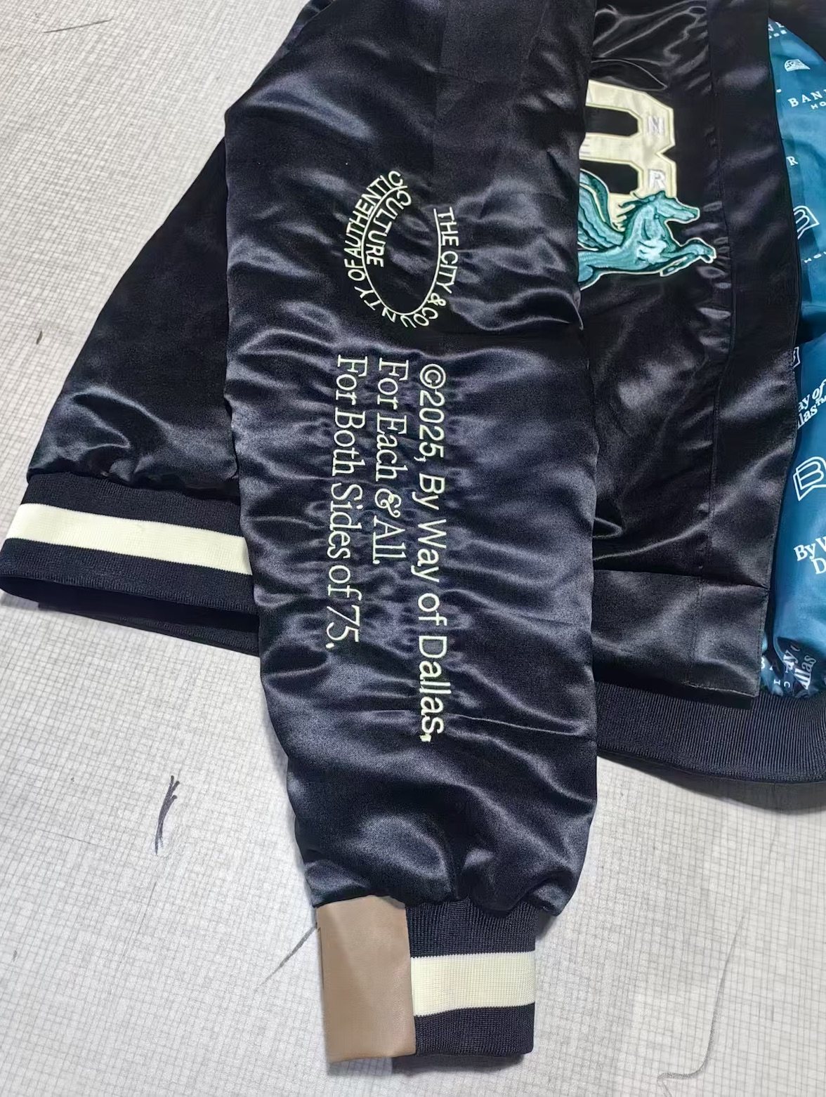 Banner House jacket: custom repeat lining, chenille, appliqué, leather trim and embroidery