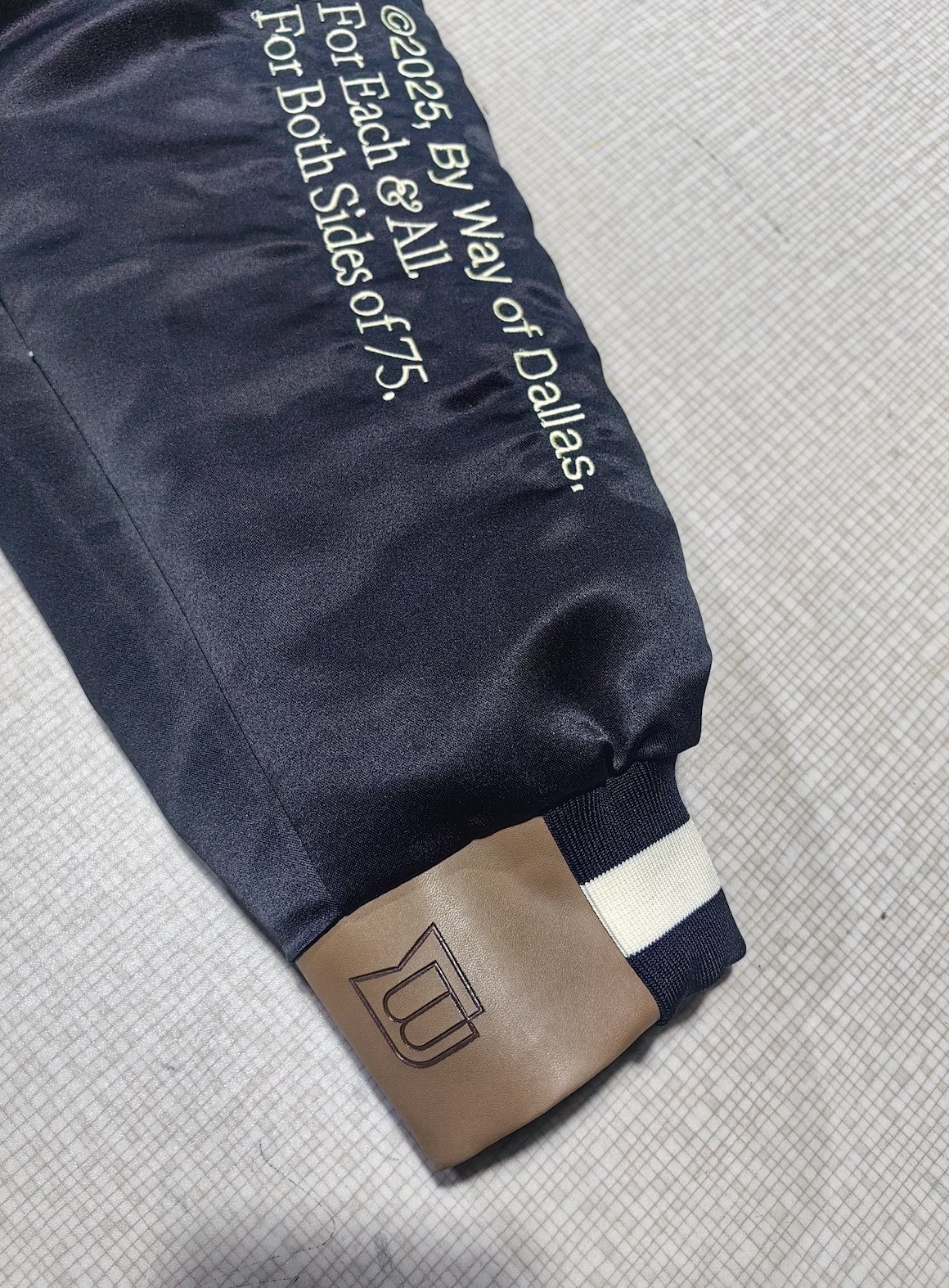 Banner House jacket: custom repeat lining, chenille, appliqué, leather trim and embroidery