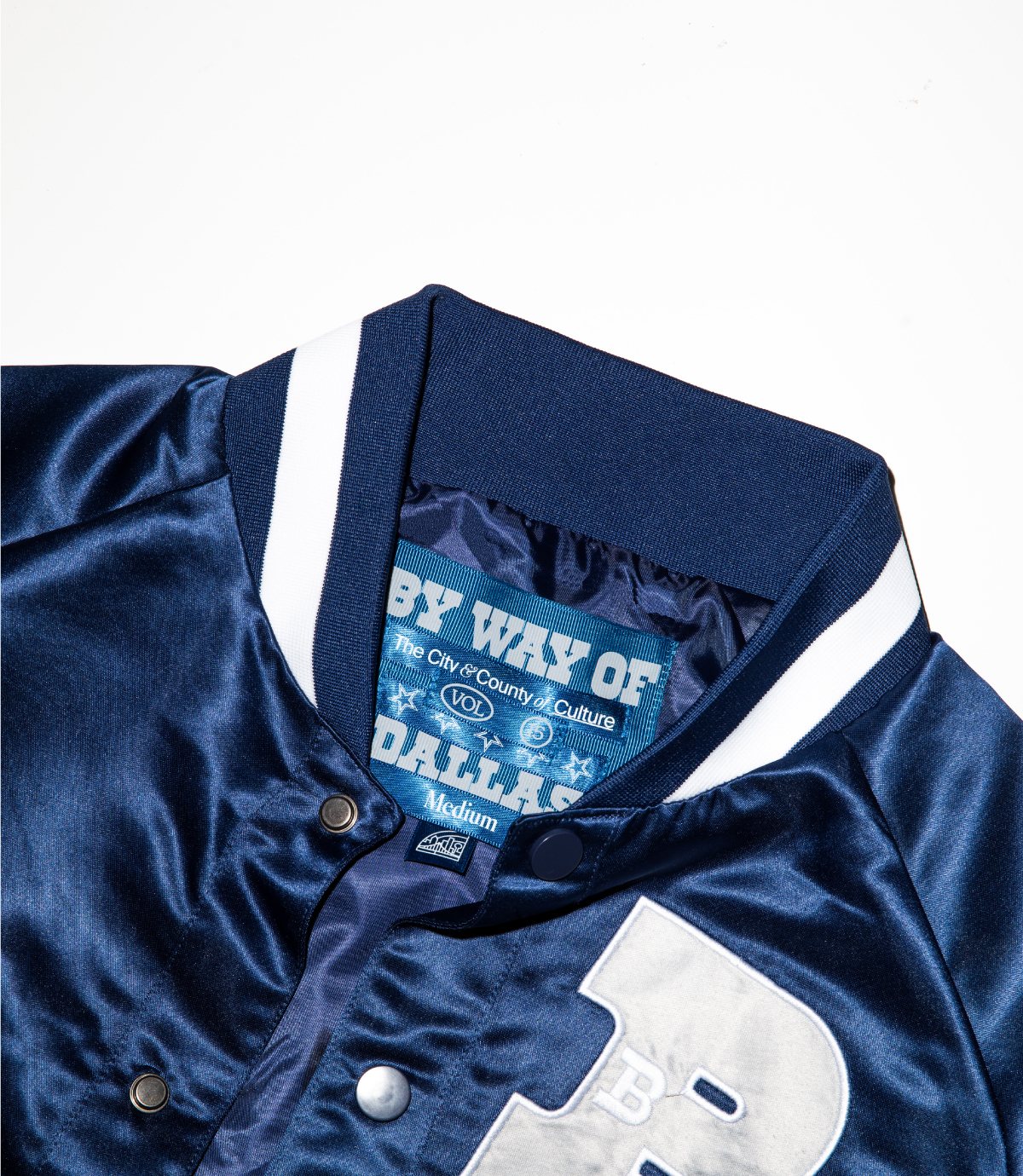 Custom woven By Way of Dallas label inside the Dallas Cowboys satin jacket