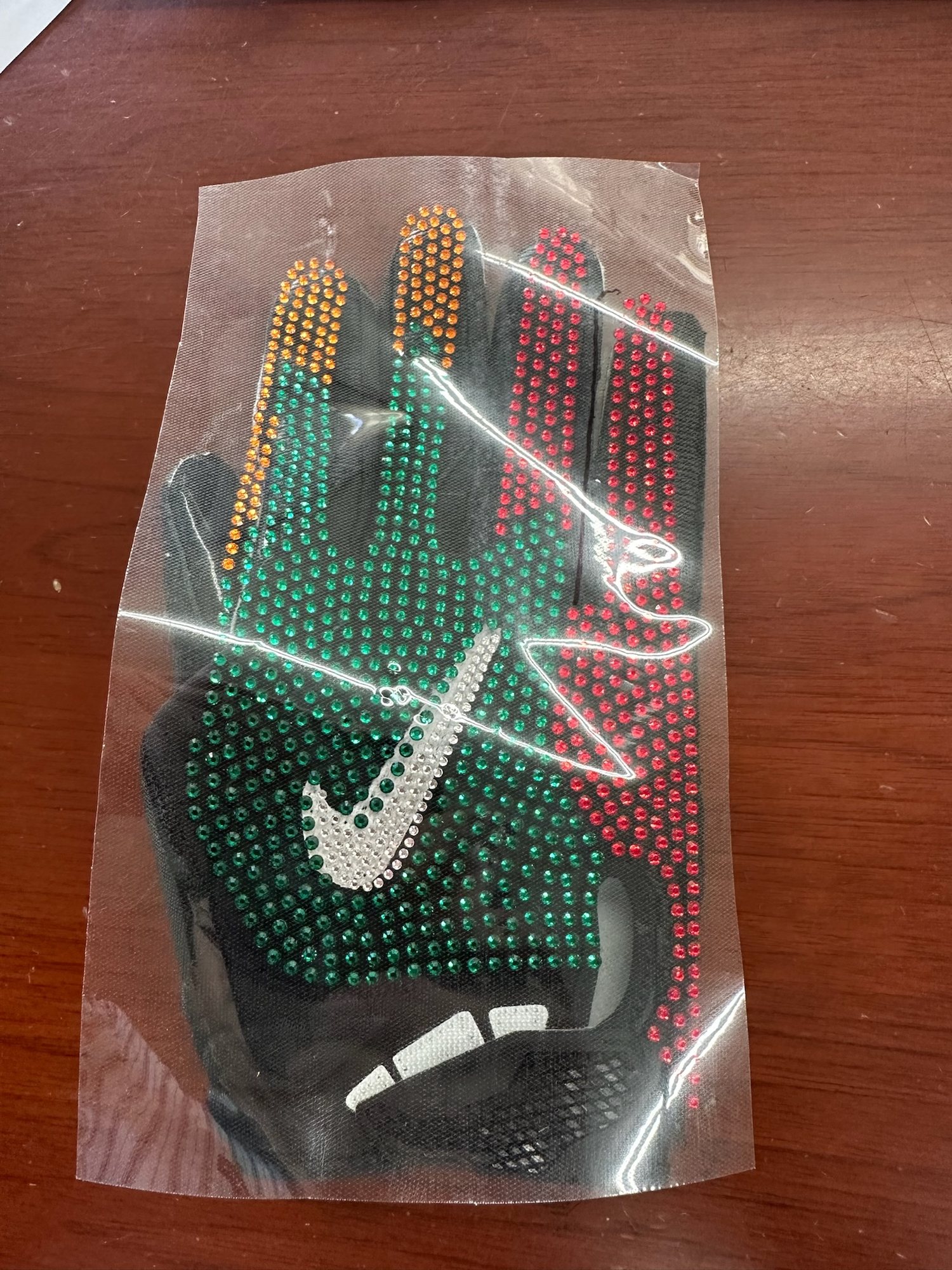 Hand-placed Swarovski crystal receiver gloves, from CAD and pattern to crystal transfer and finished glove