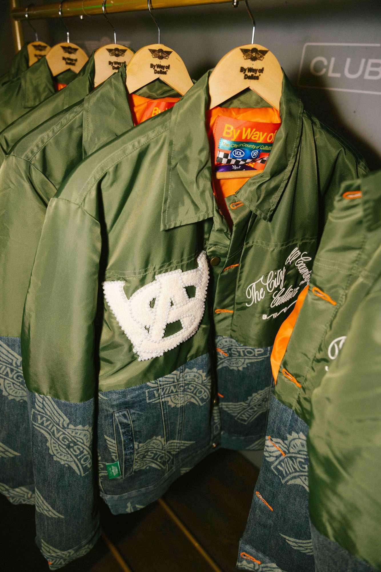 Club Wingstop limited-edition jacket at the launch activation