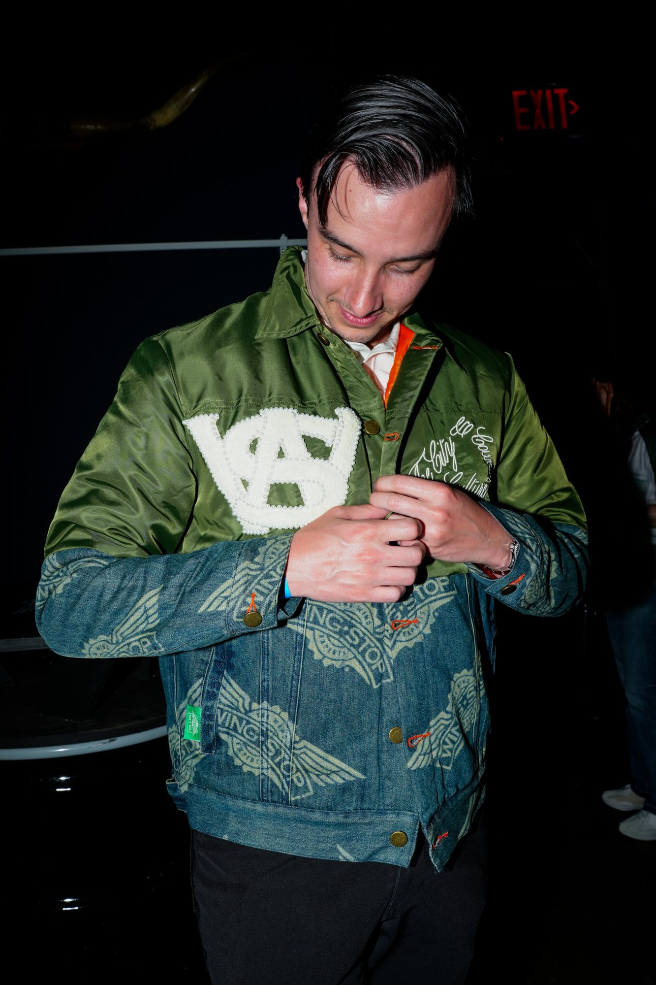 Club Wingstop limited-edition jacket at the launch activation